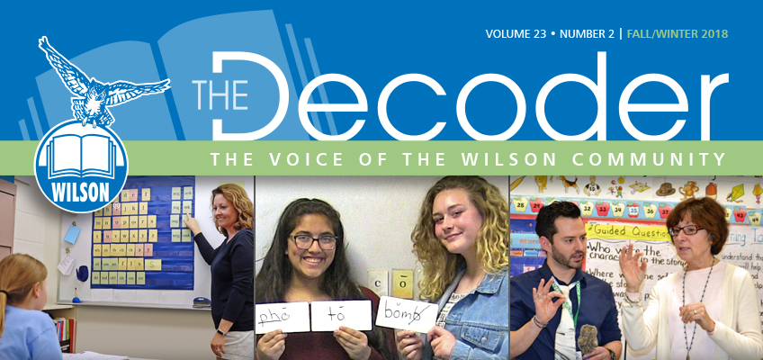 Newsletter cover titled The Decoder. It features four images: a teacher pointing at a board, two students holding cards, two people discussing an award, and a teacher with a book. An eagle logo is on the top left.