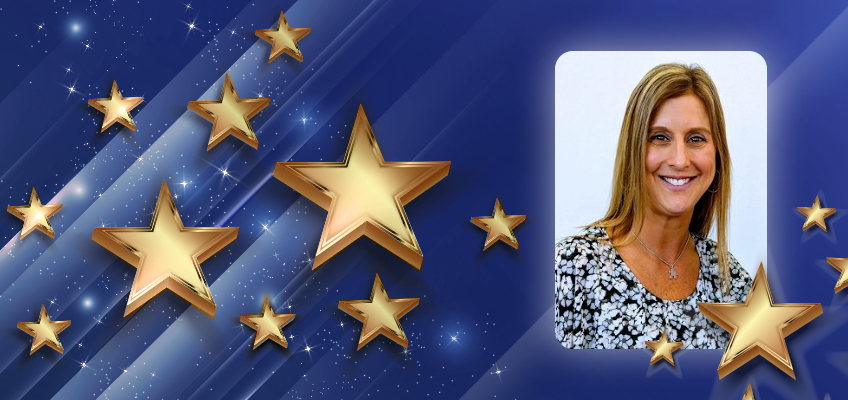 A woman with long hair smiles in a portrait against a white background. The image is set on a blue backdrop with multiple gold stars of various sizes scattered across it.