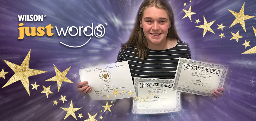 A young girl smiles while holding three certificates. Two certificates are from Chestatee Academy and the other is a Presidential Education Award. The background is purple with gold stars.