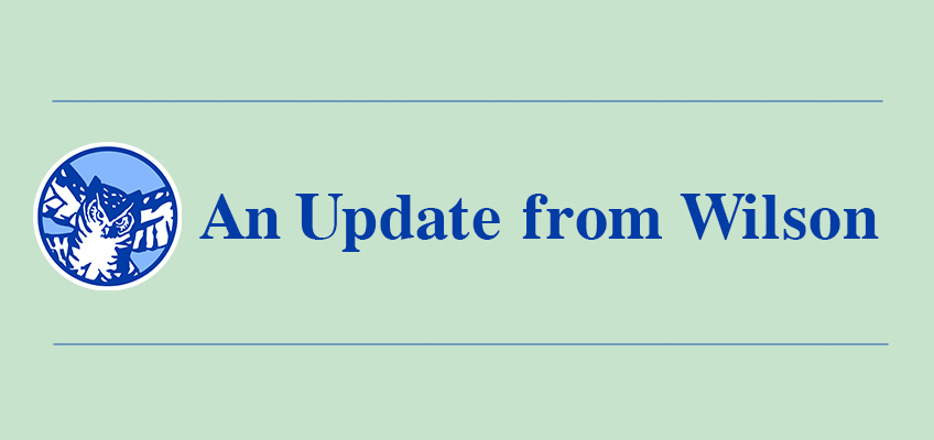 A green background with blue text that reads An Update from Wilson. On the left, there is a circular design featuring a stylized eagle with spread wings.