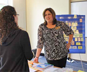 Workshop instructor interacting with participant