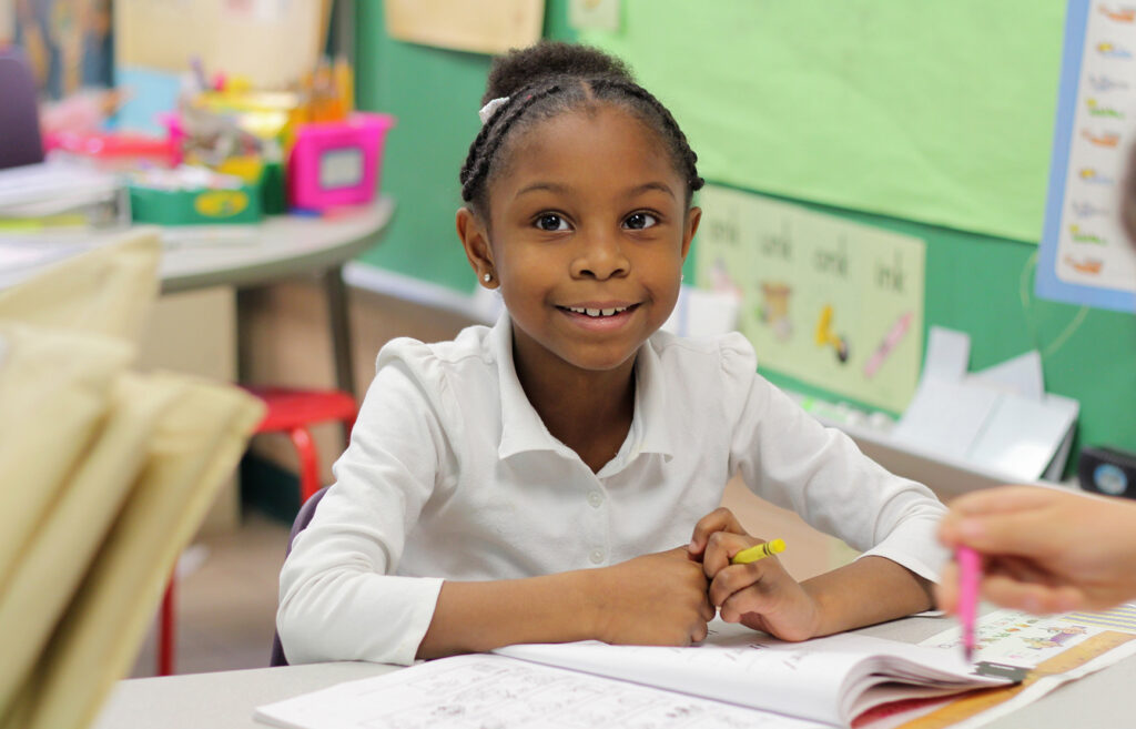 Young student smiling at camera