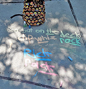 evan simposons wrs multisensory practice 2 Words written in chalk on sidewalk
