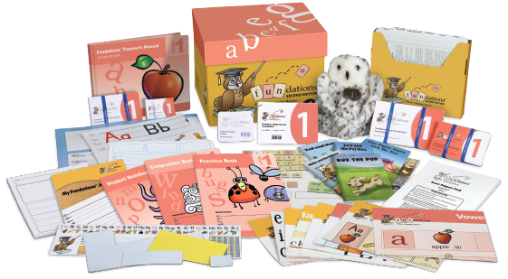 A collection of educational materials with books, worksheets, flashcards, and a plush owl centered around teaching foundational skills. Items are labeled with "1" and include alphabet cards, practice books, and various instructional guides.