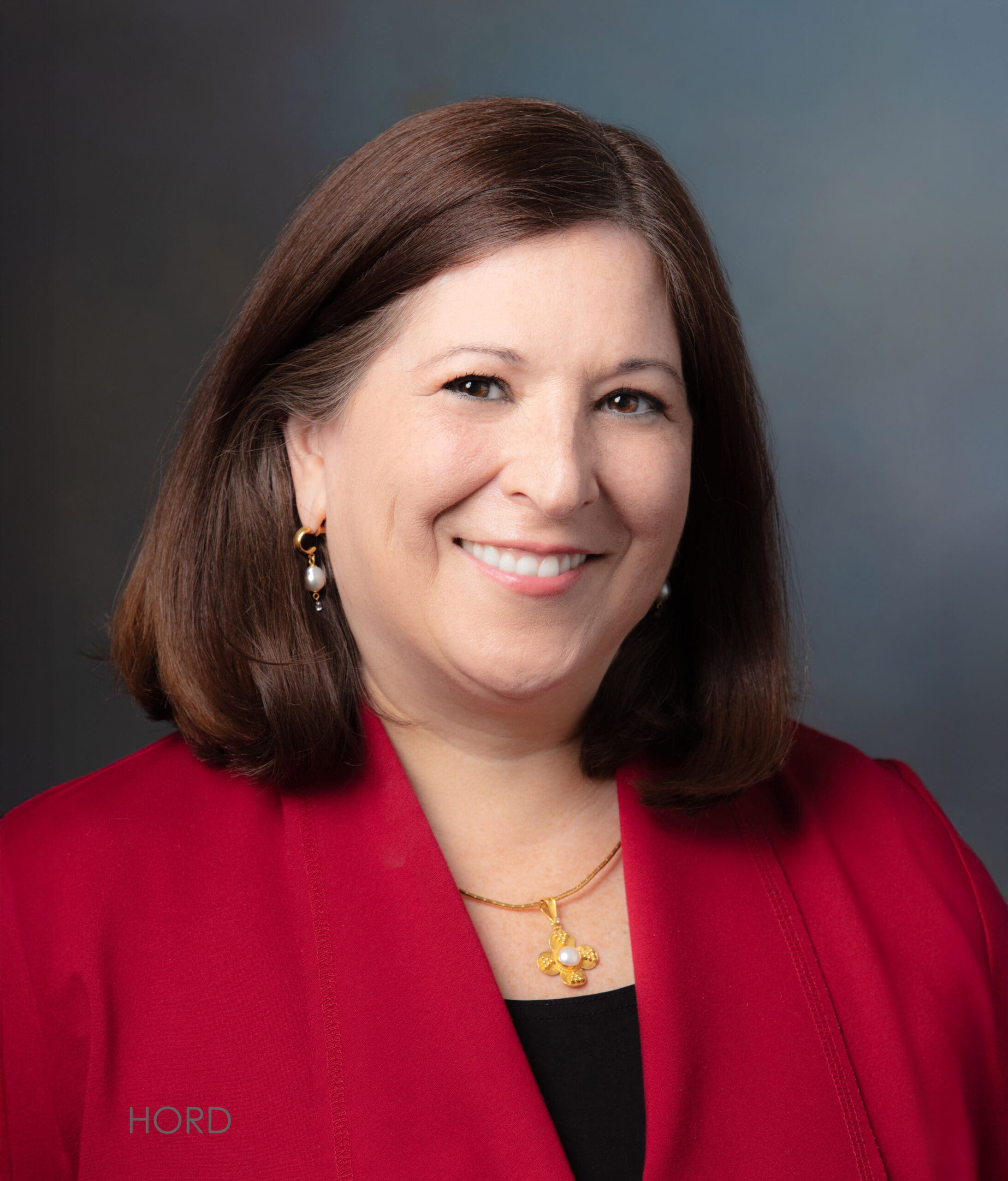 Portrait of a woman, speaker at the 2026 Structured Multiliteracy Symposium