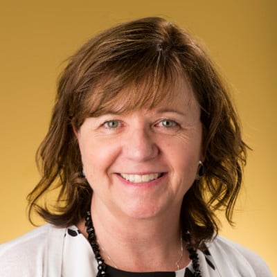 Portrait of a woman discussing dyslexia and evidence-based instruction.
