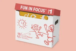 FiF Image A Fun in Focus™ Level 1 boxed set on a peach-colored background. The box features red illustrations of children playing and a smiling sun, along with the Fun in Focus™ logo and branding.