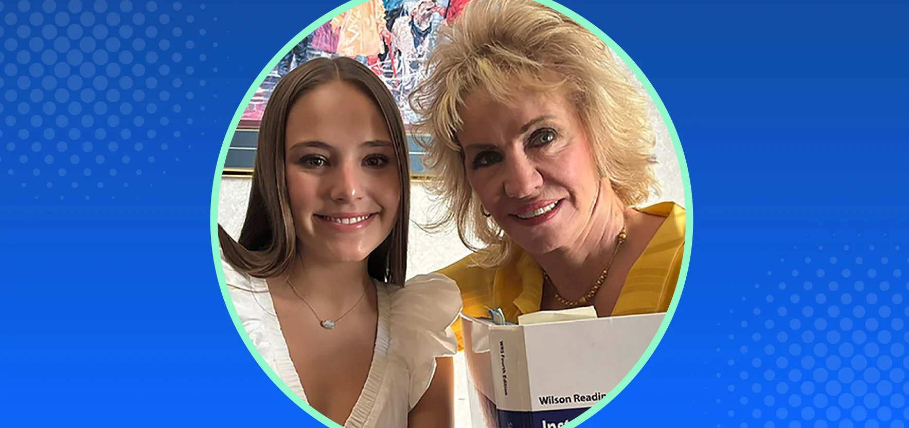 Student with dyslexia and teacher holding Wilson Reading System book